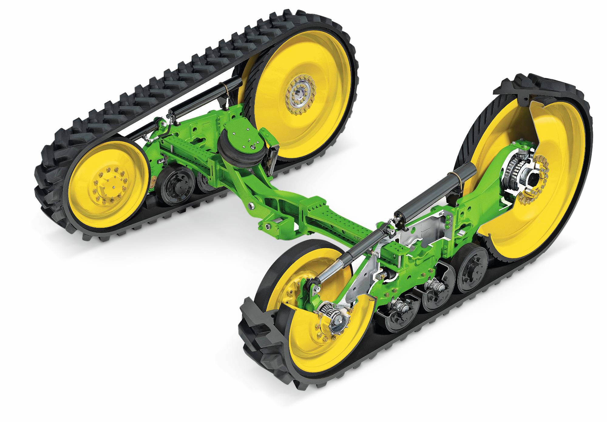 Sklopovi gusenica traktora John Deere sa gumenim gusenicama, ramenima ogibljenja i žutim pogonskim točkovima, prikazani na beloj studijskoj pozadini.